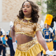 A member of Southern University’s “Fabulous Dancing Dolls” marches out of the stadium after a game at Amon G. Carter Stadium in Ft. Worth, TX.